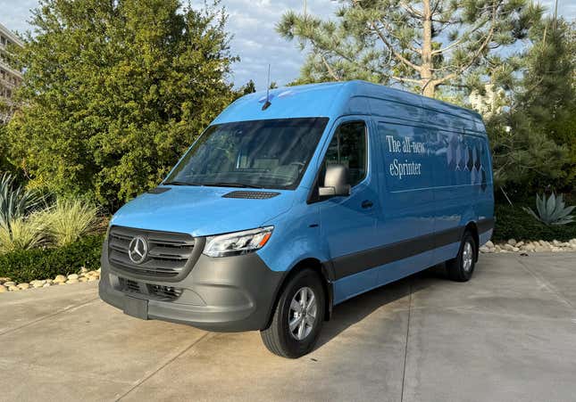 Front 3/4 view of a blue Mercedes-Benz eSprinter