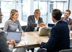 Group of businesspeople around a table