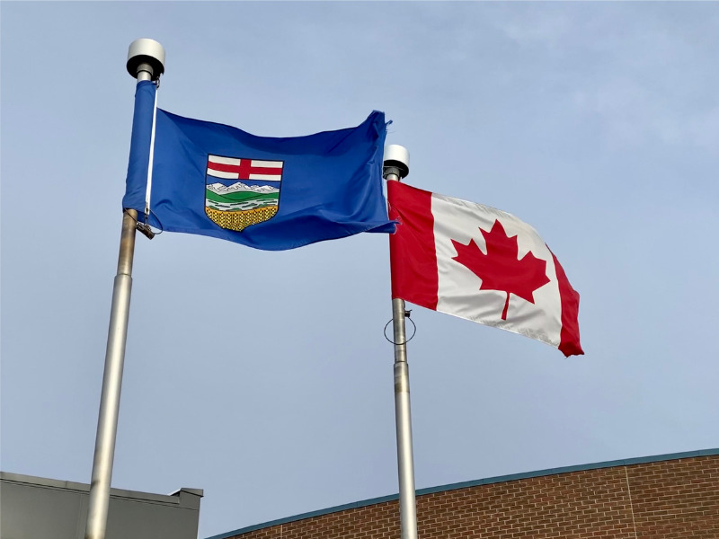 Alberta and Canada flags