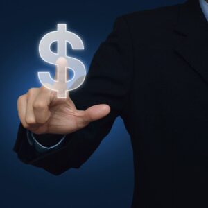 Businessman hand pushing dollar sign icon