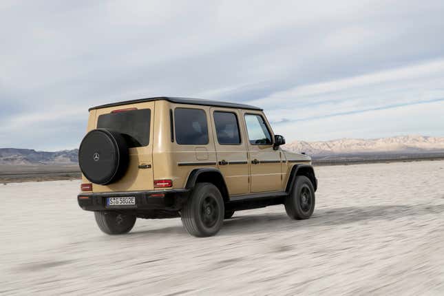 Rear 3/4 view of a beige 2025 Mercedes-Benz G580 EV