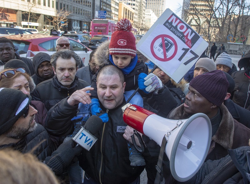 Quebec taxi driver protesting new government regulations.