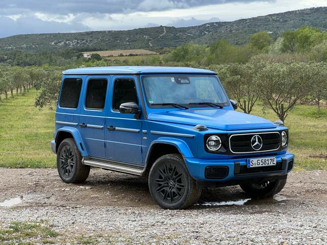 Front 3/4 view of a blue Mercedes-Benz G580 EV