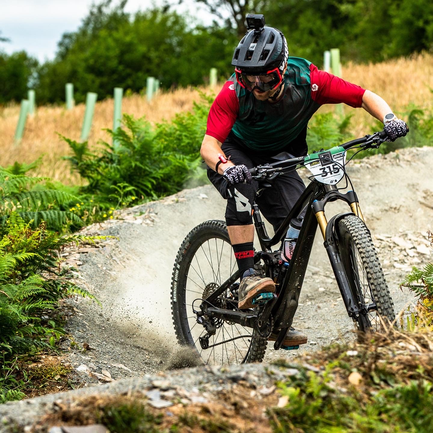 Mountain biker riding through a corner