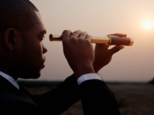 Looking through a telescope to see the business horizon