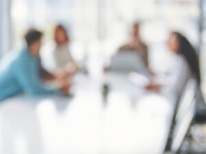 Defocused image of business people during a meeting