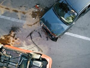 Elevated view of broken cars after accident.