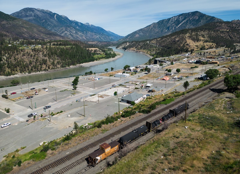 A CPKC firefighting train sits on the tracks above the village of Lytton, B.C., on Tuesday, June 25, 2024. Mayor Denise O'Connor shared an update on the rebuilding progress Tuesday, ahead of the third anniversary of the fire that destroyed 90 per cent of the community. THE CANADIAN PRESS/Darryl Dyck