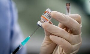 Former insurance employee gets damages in religious beliefs vaccine case