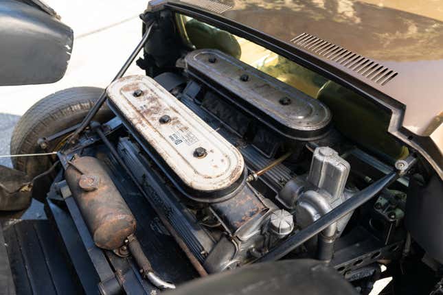 Engine bay of a brown Lamborghini Miura P400 S