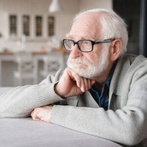 A worried-looking older man