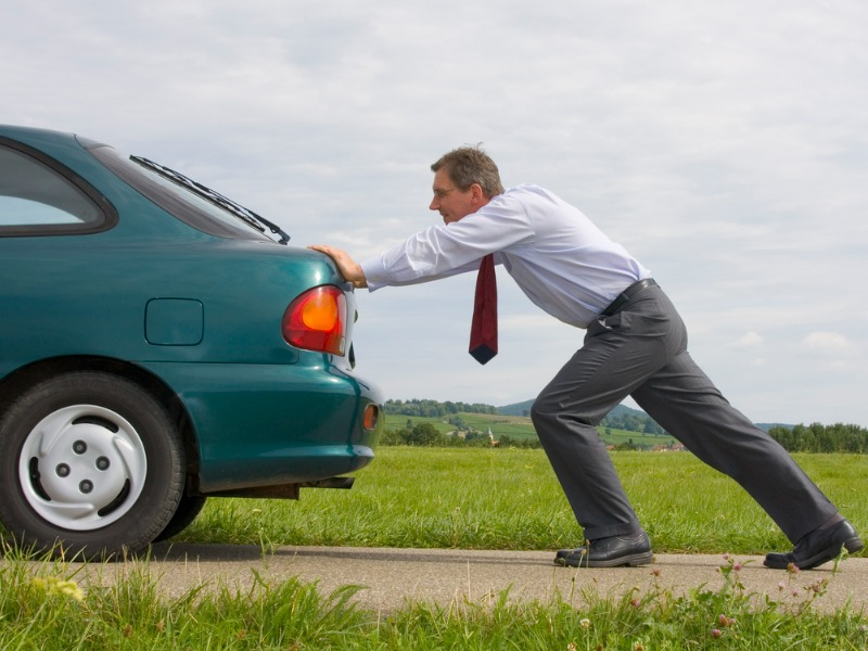 Pushing a broken down car