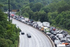 Traffic backs up on the Don Valley Parkway due to flooding following heavy rain in Toronto, on Tuesday, July 16 2024. THE CANADIAN PRESS/Arlyn McAdorey