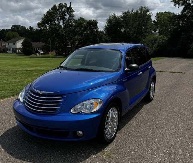 A front 3/4 shot of the eectric blue PT Cruiser looking perfectr