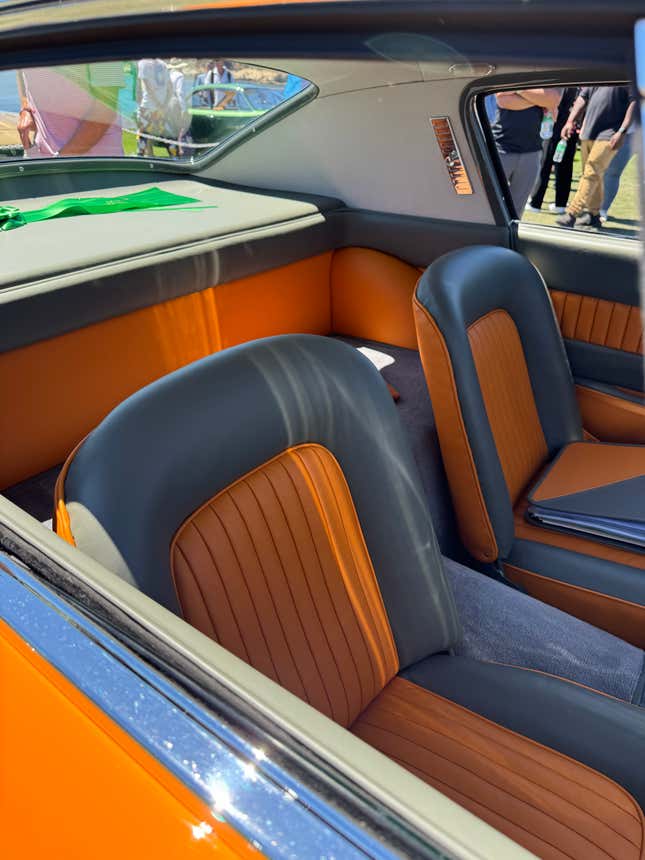 Seats of an orange and grey 1954 Ferrari 375 MM Ghia Coupe