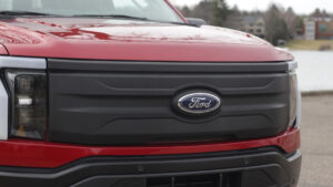 Ford cancels electric three-row SUV, pivots to hybrid