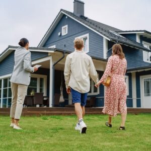 Realtor showing a house to a couple