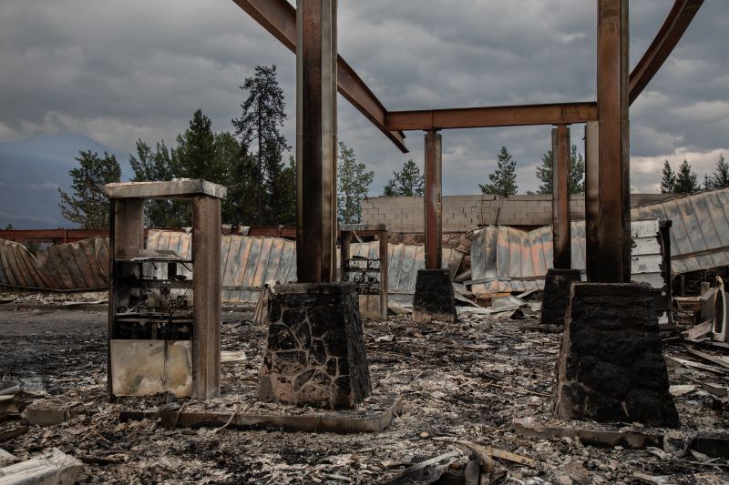 The remains of a Petro Canada gas station in Jasper, Alta., on Friday July 26, 2024. Wildfires encroaching into the townsite of Jasper forced an evacuation of the national park and have destroyed over 300 of the town's approximately 1100 structures, mainly impacting residential areas. THE CANADIAN PRESS/Amber Bracken