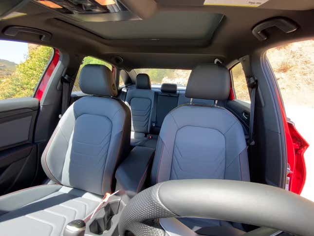 A wide shot looking back at the cabin of the GLI showing the front and rear seats