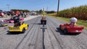 The Dads Are Taking Their Modded Power Wheels Drag Racing