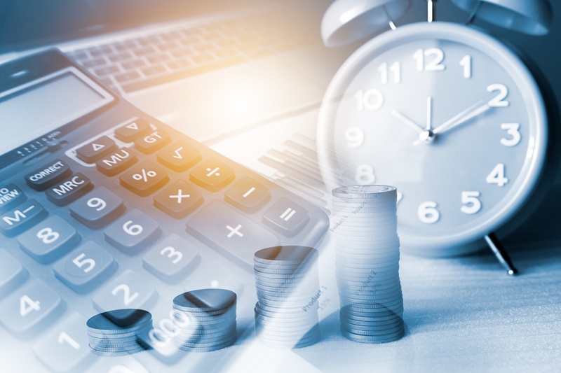 Coins, calculator and clock